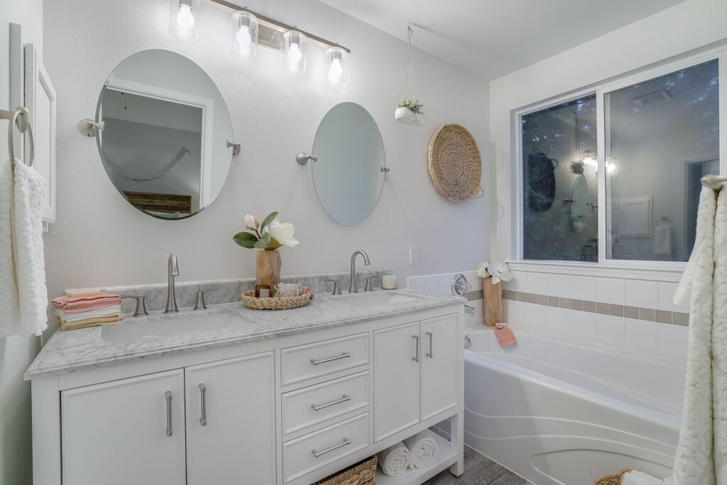 Green subway tile kitchen backsplash installed by professional tilers.